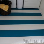 Painted striped vinyl floors, teal and white, how to paint sheet flooring, how to paint sheet floors